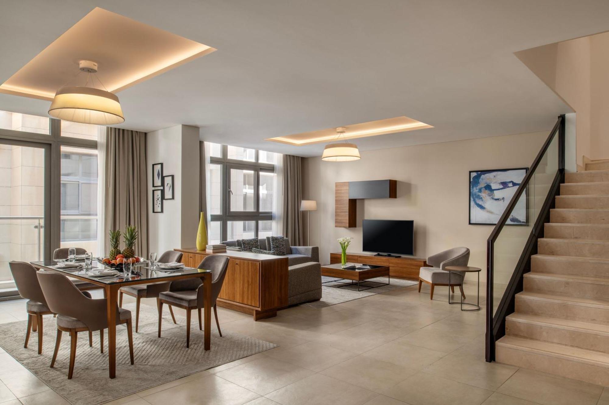 Three-Bedroom Duplex Apartment with Balcony and City View
